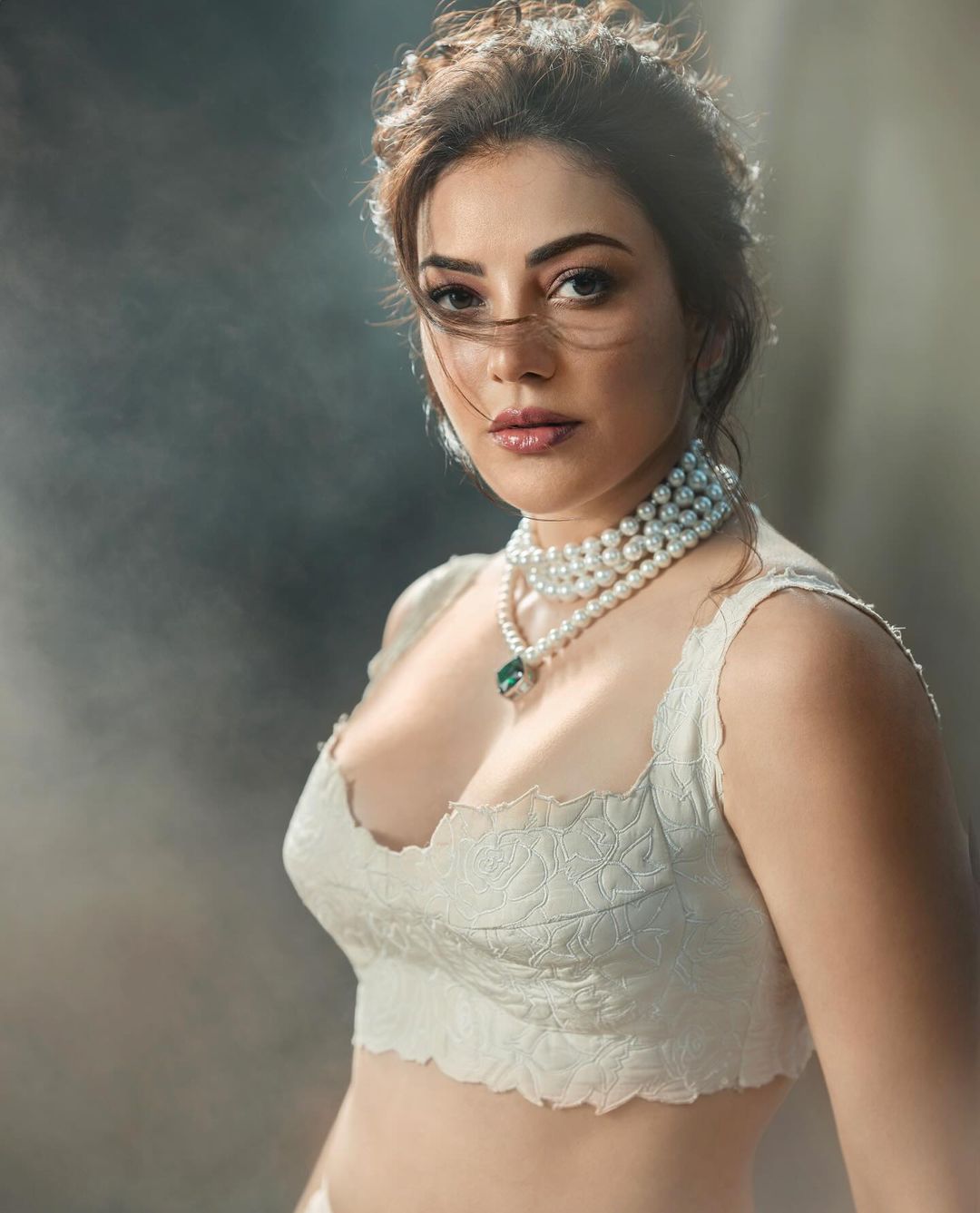 Indian Actress Kajal Aggarwal Stills in White Lehenga Choli